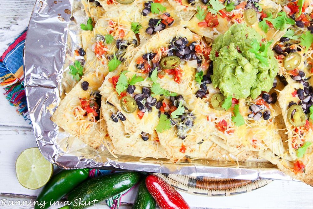 Close up of black beans, cheese and guacamole.