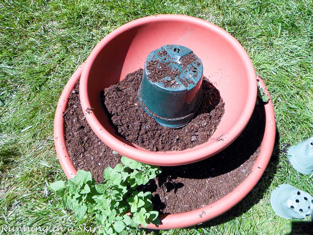 How to Make and Herb Tower showing how to stack the pots.