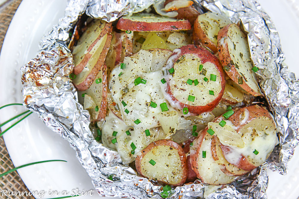 Overhead shot of grilled potatoes in foil.