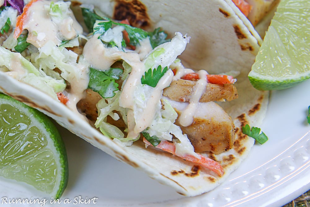 Close up of the healthy Mahi Mahi Fish Taco with the Chipotle Sauce drizzled on top.