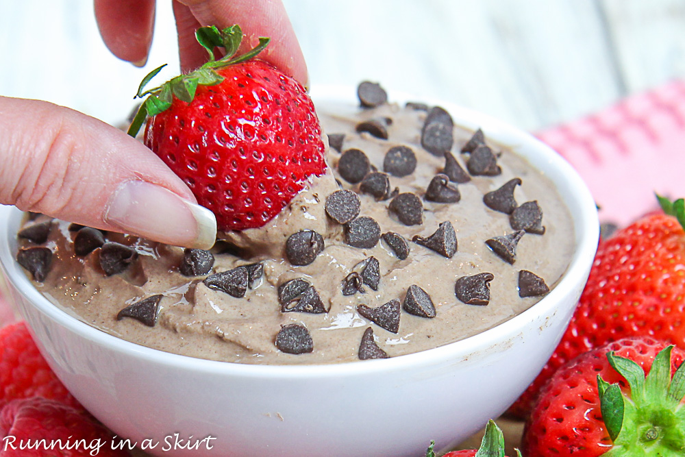 Strawberry going into the greek yogurt dessert dip.