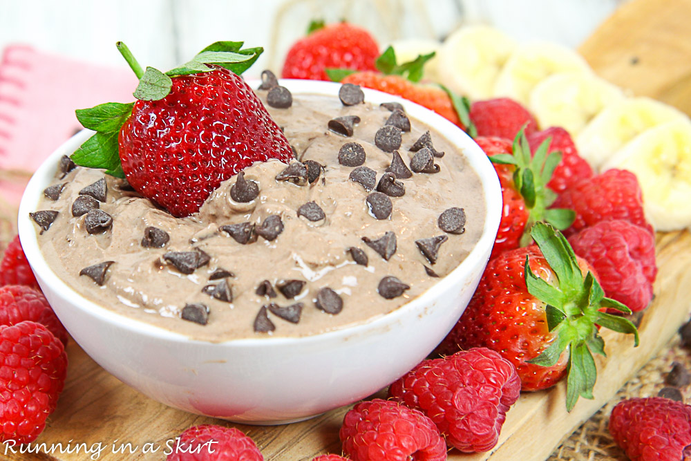 Plated shot of the Chocolate Greek Yogurt Fruit Dip with fruit surrounding it.