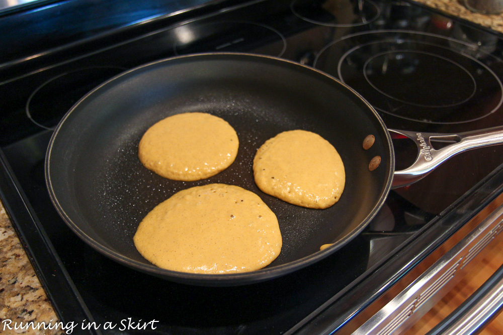 Process photos showing the pancakes cooking on the stove in a pan.