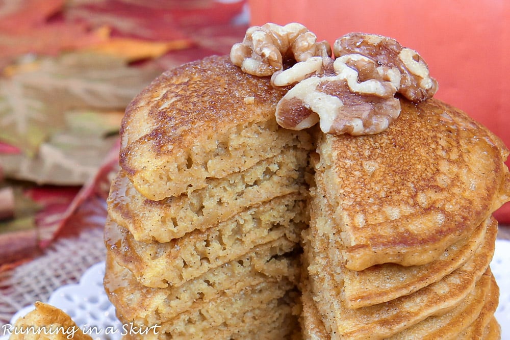 A stack of Pumpkin Pancakes with Pancake Mix with a slice cut out.
