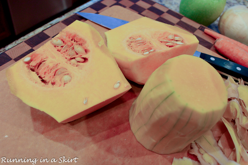 Cut whole butternut squash on a cutting board show how to cut the squash.