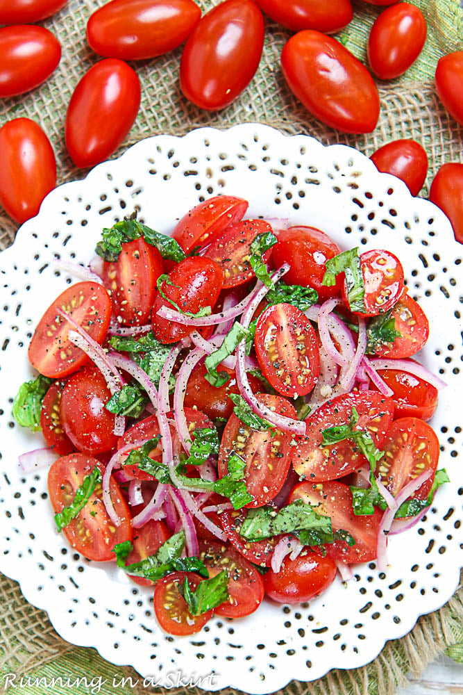Overhead shot of cherry tomato salad with marinated cherry tomatoes.