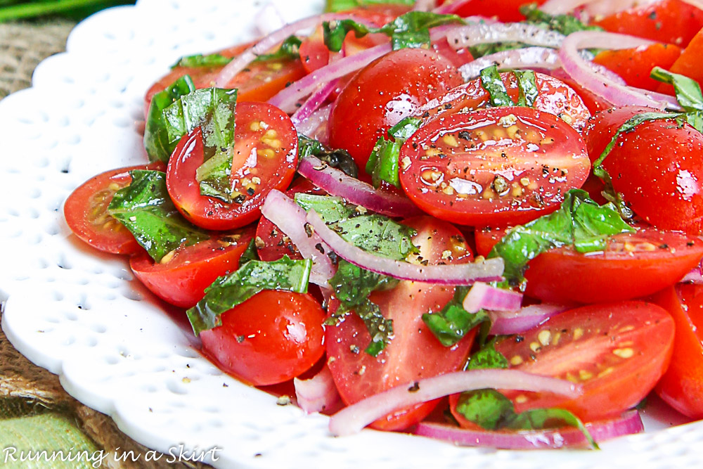 Marinated Cherry Tomatoes salad on a white plate.