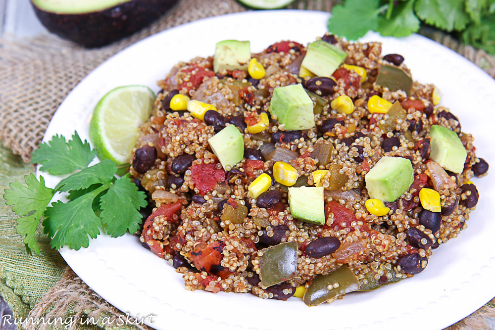 Plate of One Skillet Mexican Quinoa with a side of cilantro and lime.