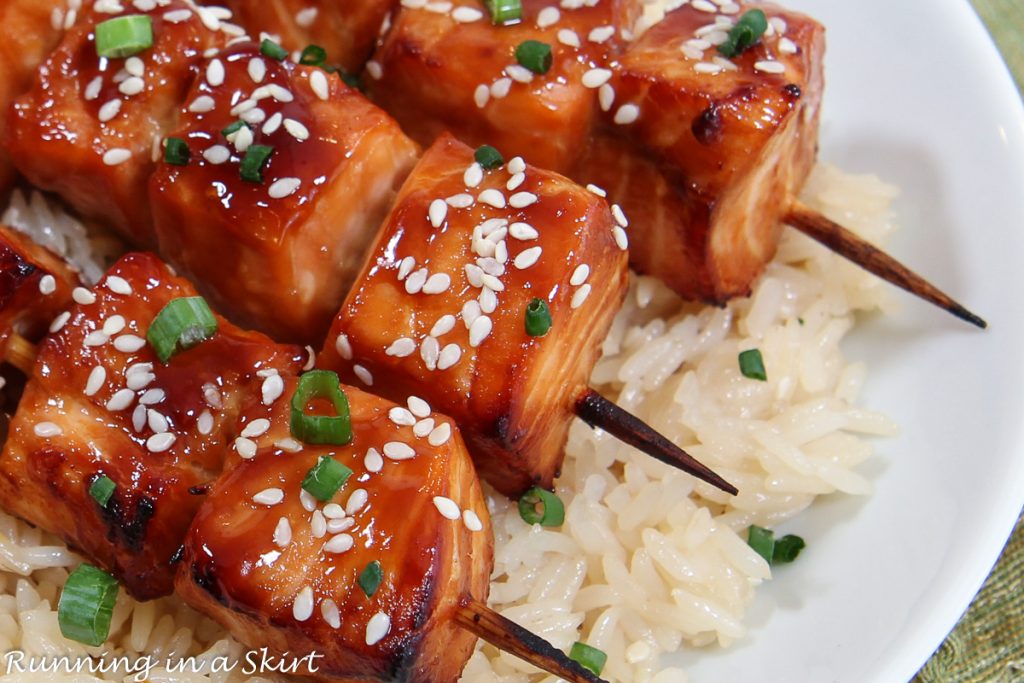 Asian Salmon Skewers with Sriracha Spicy Yogurt Sauce close up.