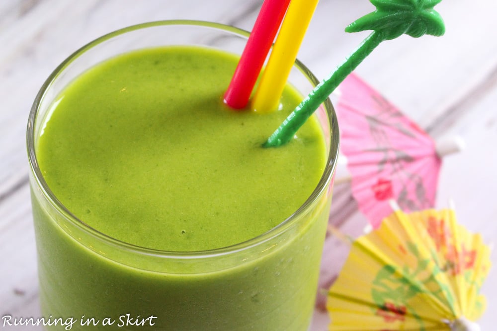 Close up of Island Green Smoothie with a palm tree straw.