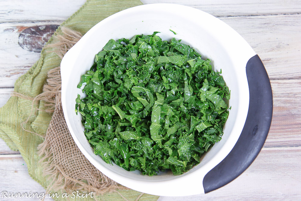 Process photo showing how to massage the kale.