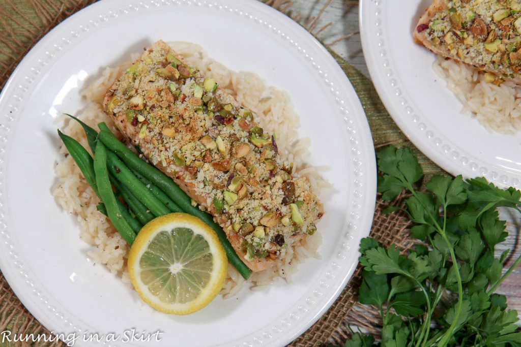 Pistachio Crusted Salmon overhead shot on two white plates.