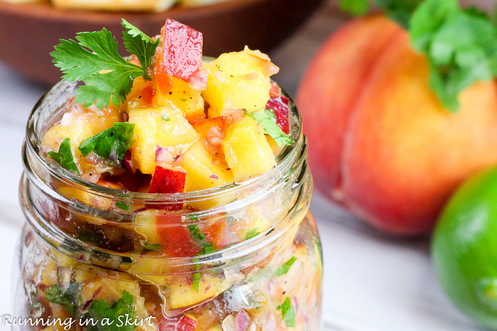 Closeup of the fresh Peach Salsa recipe in a jar.