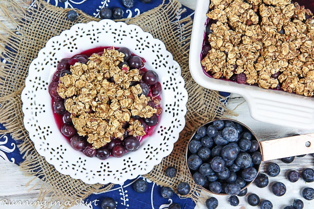 Overhead shot of the healthy blueberry dessert on a white plate.