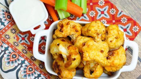 Buffalo Roasted Cauliflower- Sideline Meat Monday Night with this tasty game day treat!