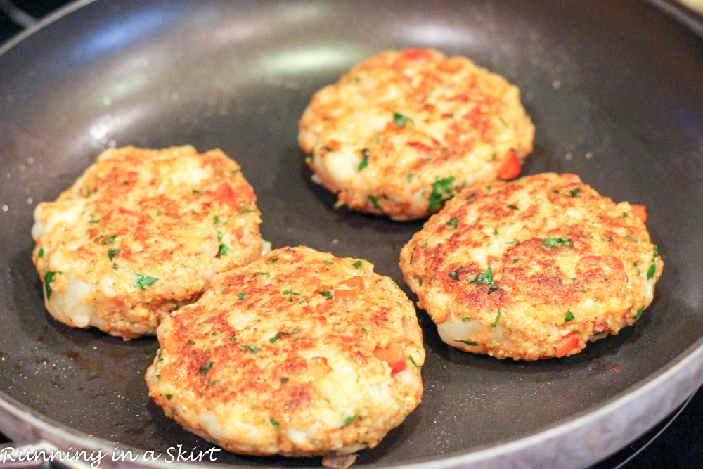 Process photo showing the burgers on a skillet.