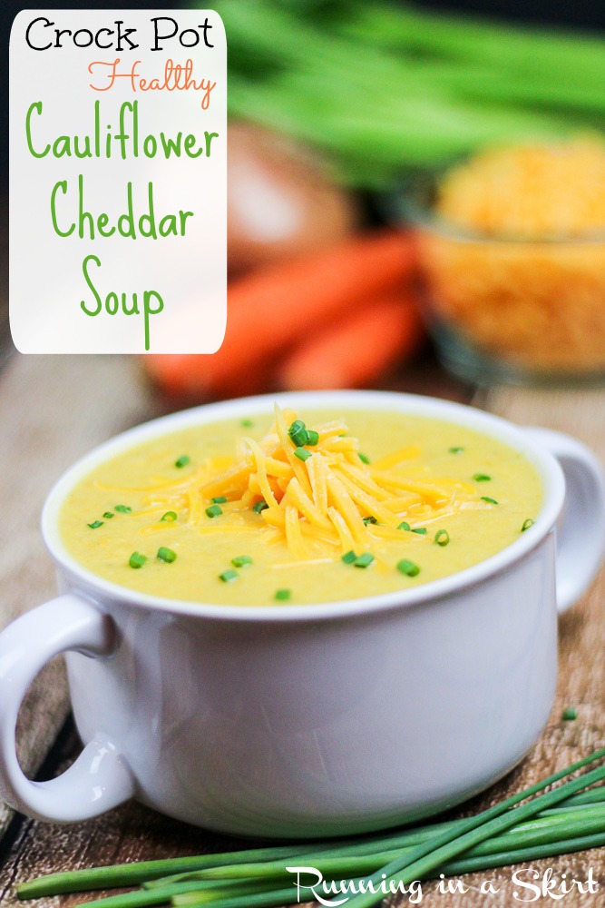 Cauliflower soup in a white serving bowl.