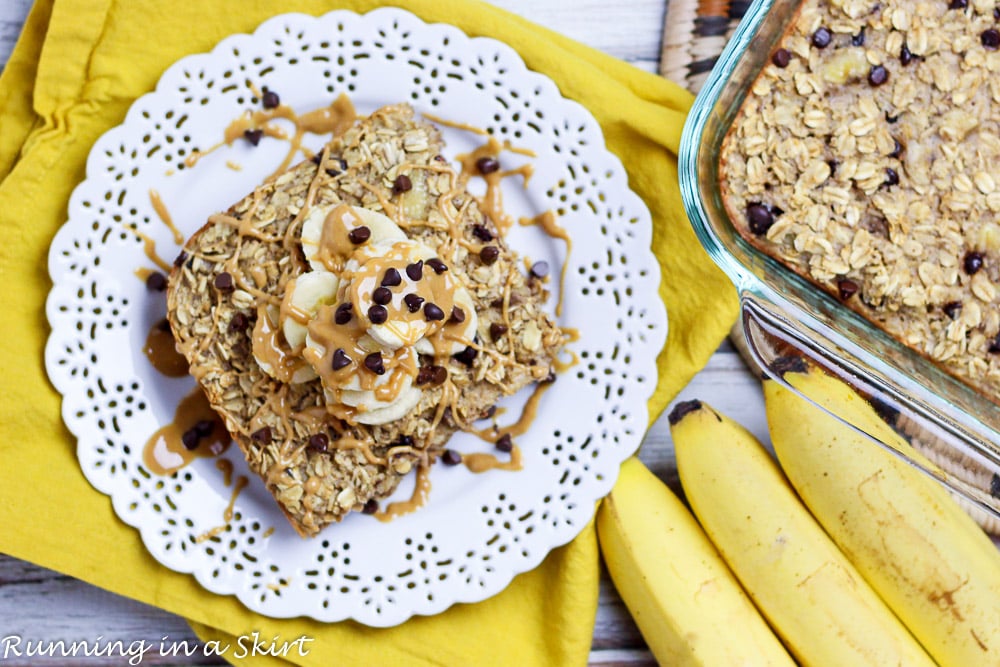 Overhead shot of Chunky Monkey Peanut Butter Baked Oatmeal on a white plate and in the baking dish.