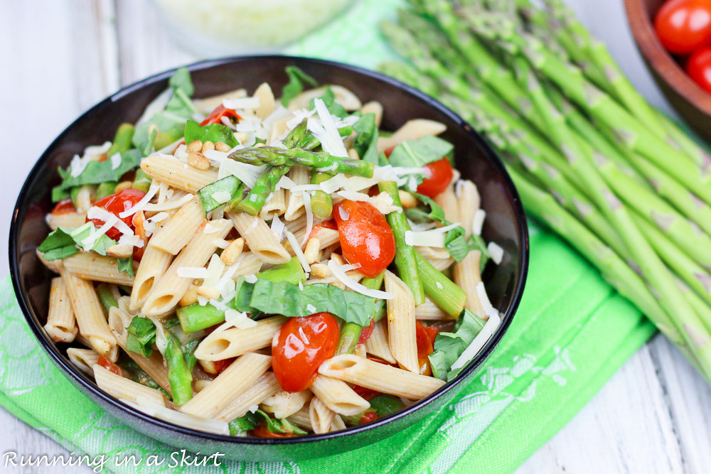 Asparagus Pasta Recipe with tomatoes in a serving bowl.