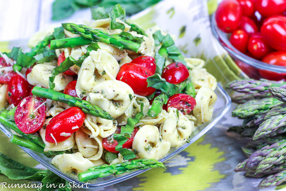 Easy Tortellini Salad in a glass bowl on a napkin.