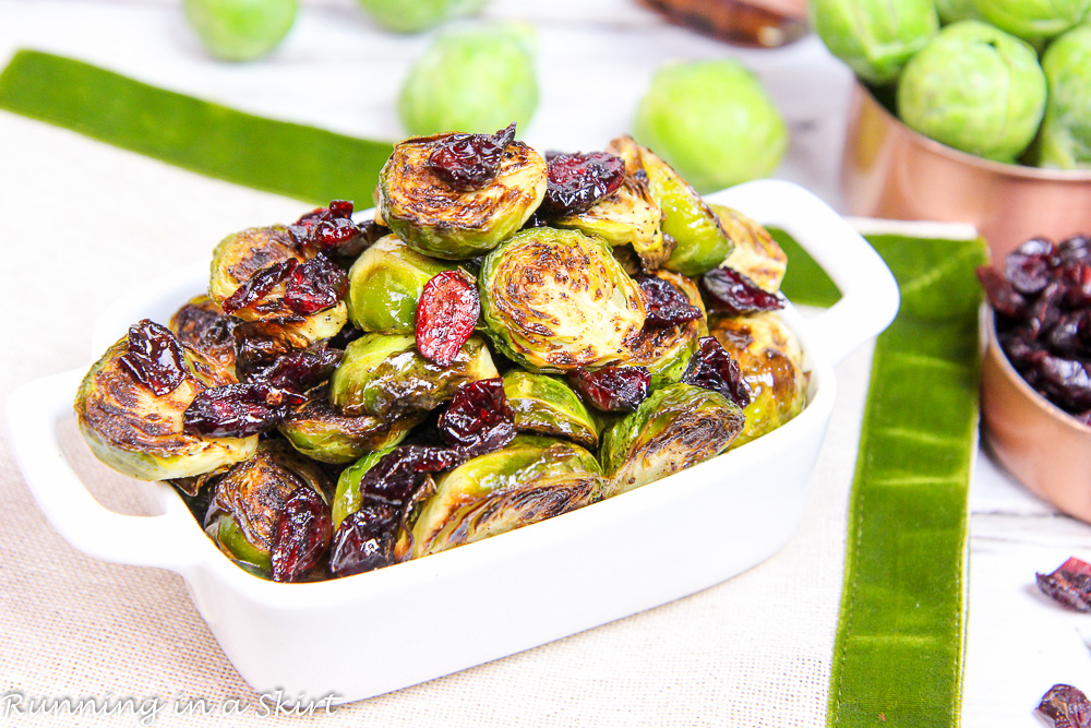 Brussels Sprouts Thanksgiving - Maple Balsamic Brussels Sprouts and Cranberries in a white serving dish.