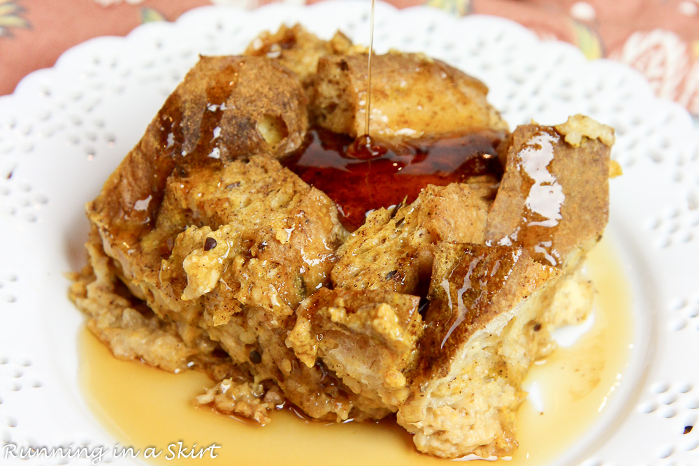Pumpkin Crock Pot French Toast Casserole with maple syrup drizzle.