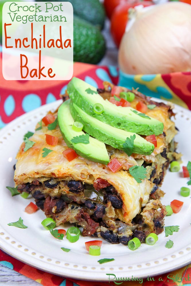 Crock Pot Vegetarian Enchilada Casserole on a white plate topped with garnishes.