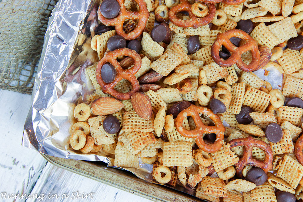 Process photo shot showing how to cool the chex mix.