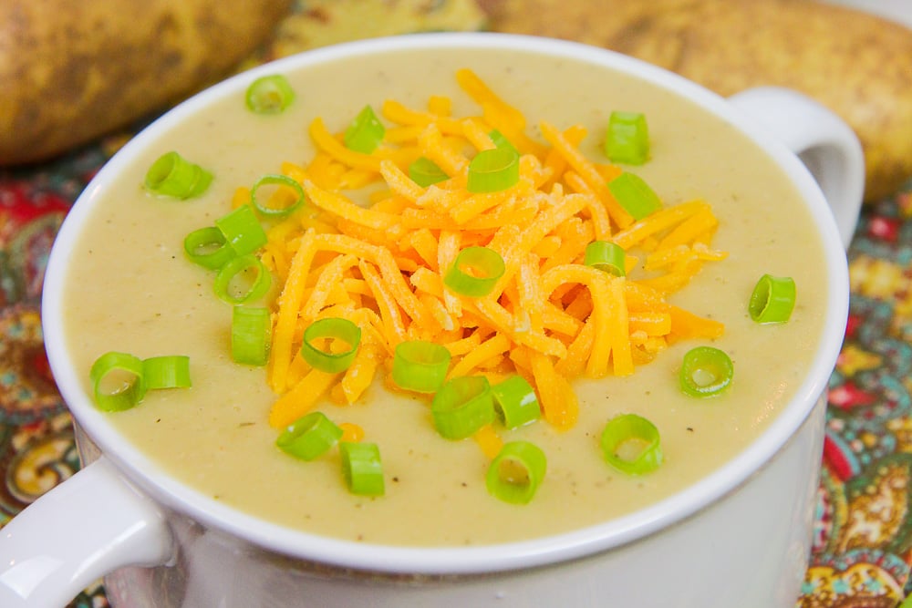 A bowl of crock pot vegetarian potato soup.