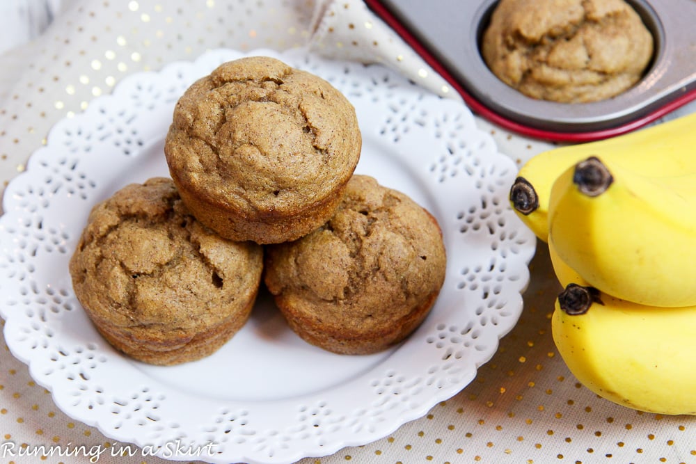 Healthy Banana Bread Muffins recipe on a white plate with bananas.