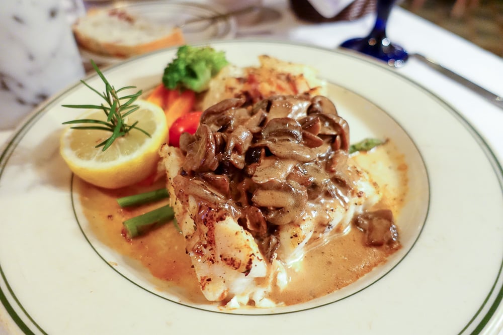 Best Restaurants in Hilton Head? Charlies featuring plate with Grouper with mushroom sauce.