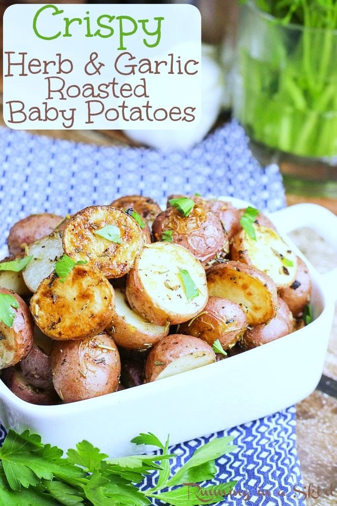 Herb and Garlic Roasted Baby Red Potatoes in a white baking dish.