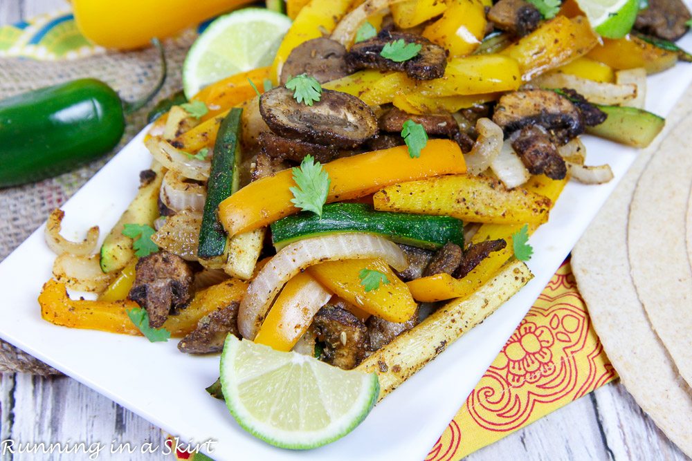 Sheet Pan Vegetarian Fajitas recipe on a white plate with limes.