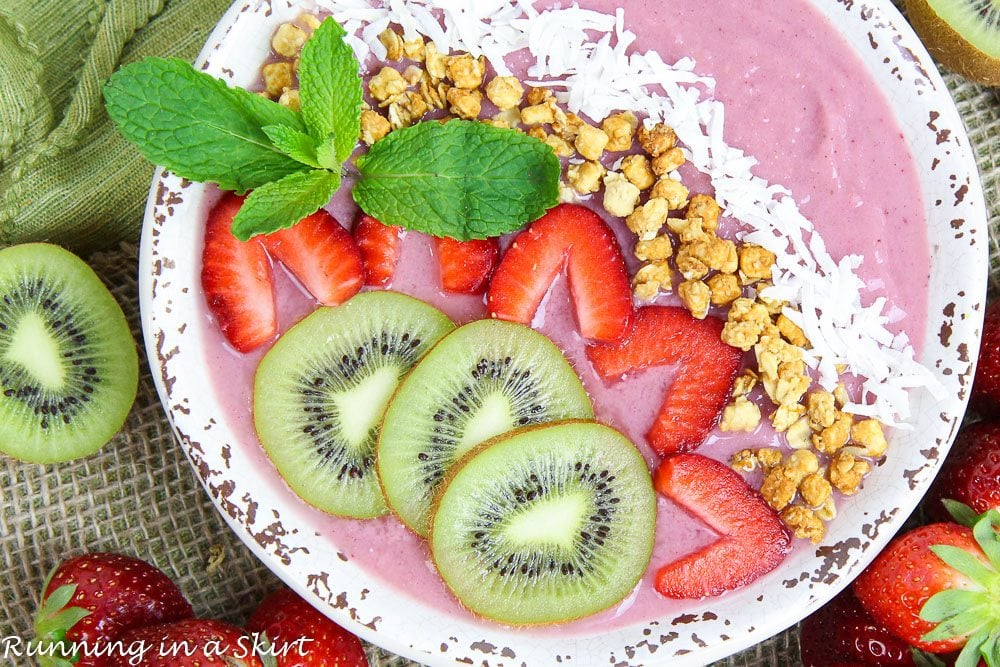 Kiwi Strawberry Smoothie Bowl Recipe in a bowl with toppings.