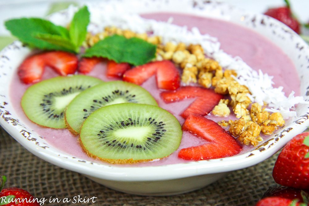 Toppings for the bowl including kiwi, strawberry and granola.