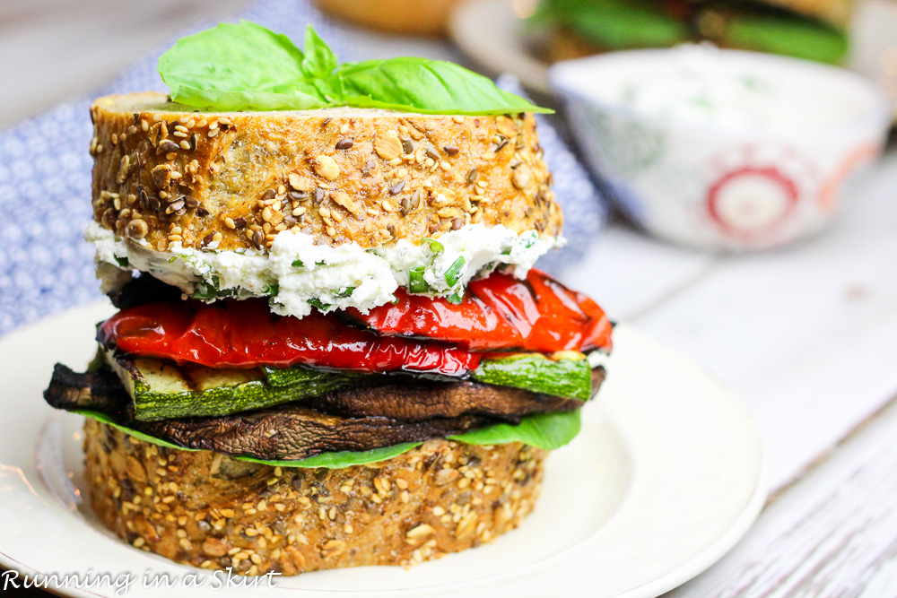 Grilled Vegetable Sandwich with Herbed Goat Cheese on a white plate.