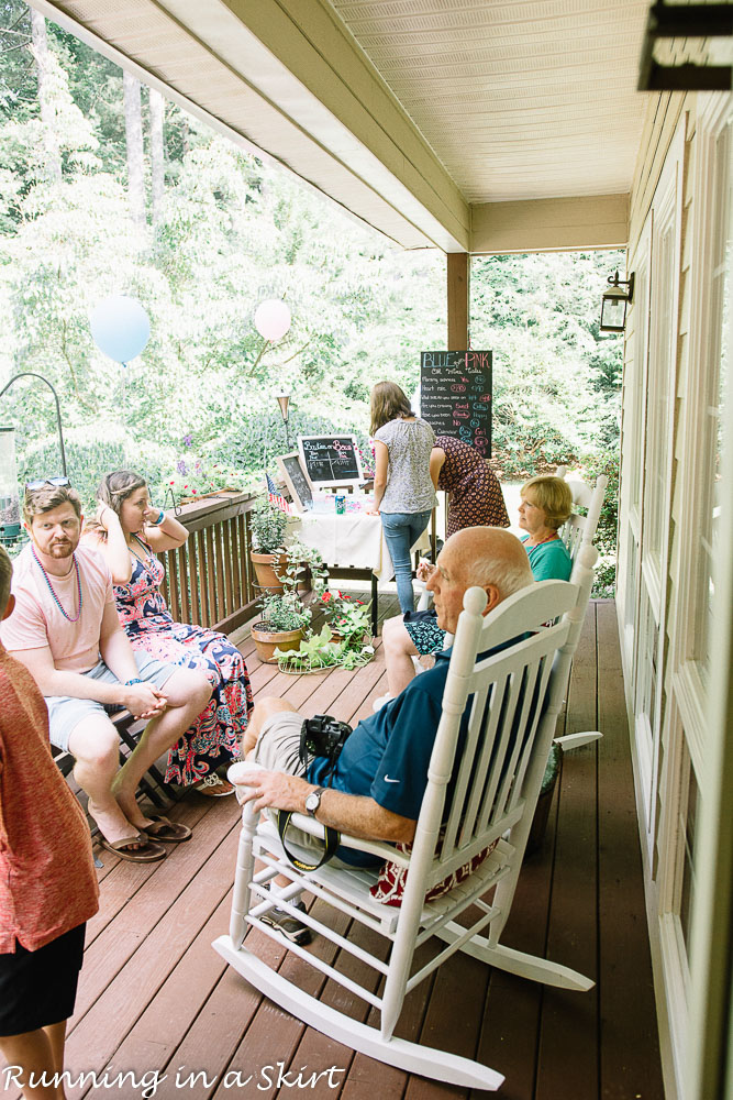 Outdoor crowd at twin gender reveal party.