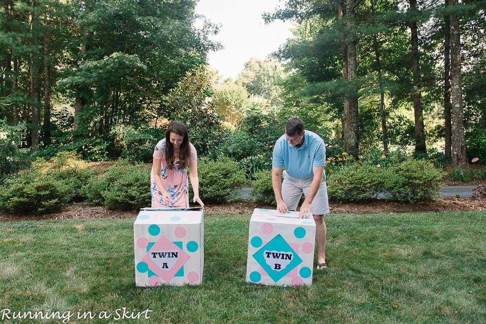 Opening of twin gender reveal boxes with twin a and twin b.