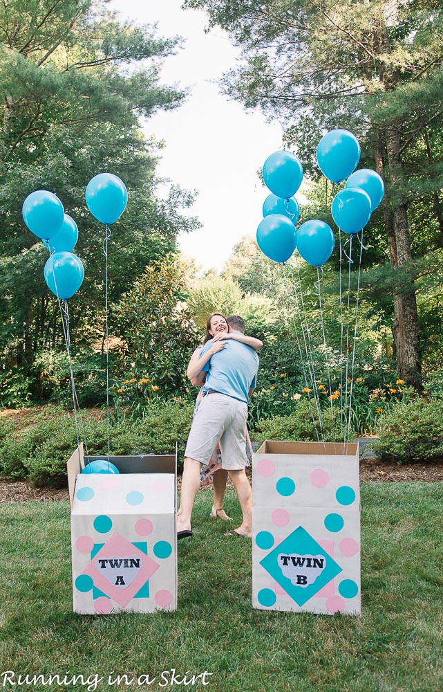 Twin boy gender reveal with blue balloons.