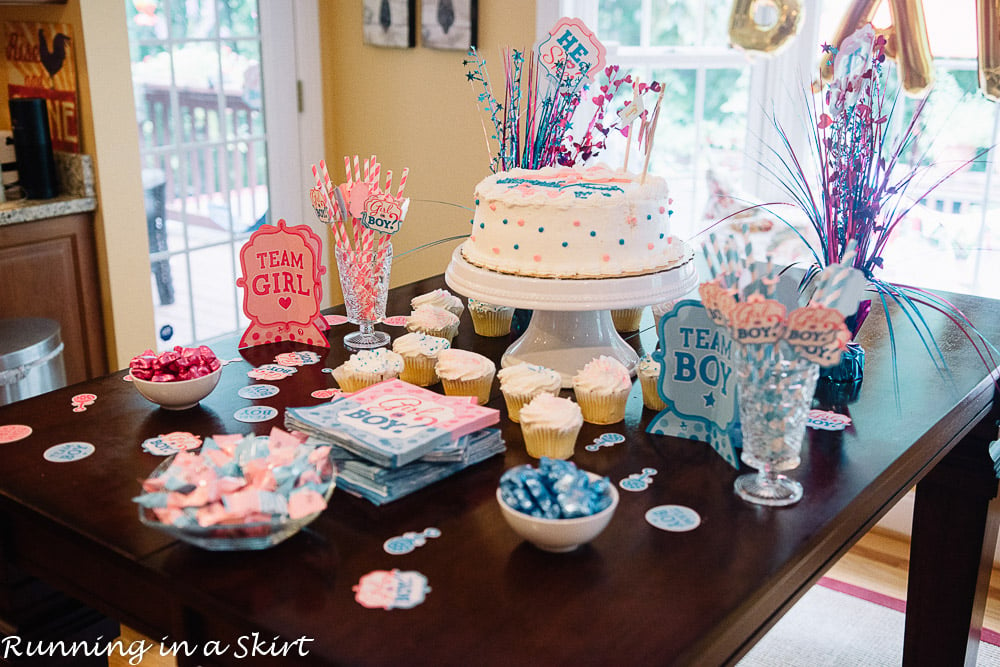 Cake for twin gender reveal showing team girl and team boy.