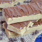 A stack of no bake peanut butter protein bars.