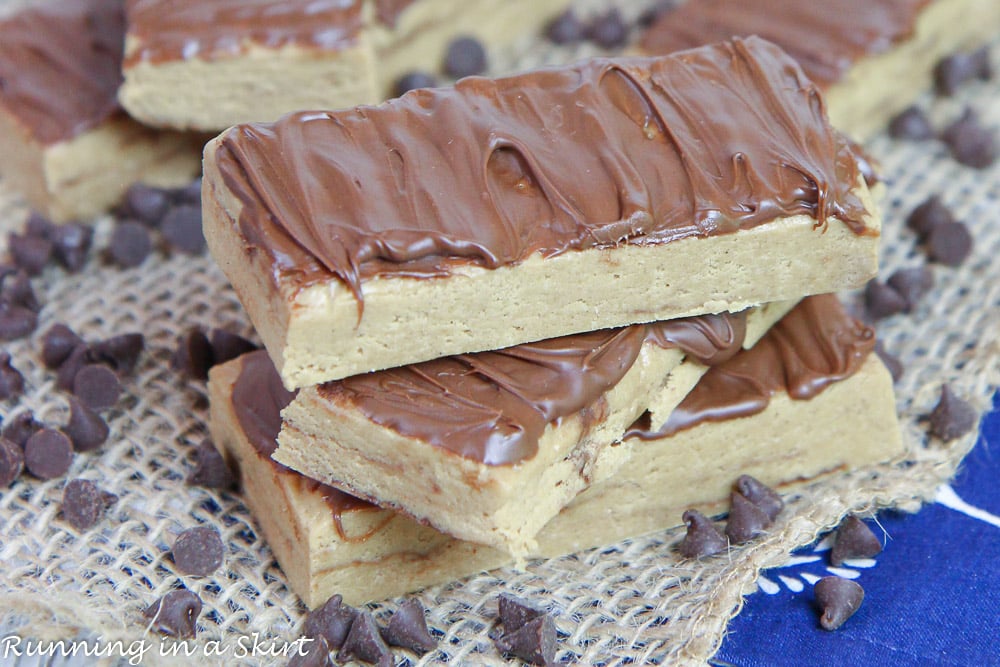 A stack of no bake peanut butter protein bars.
