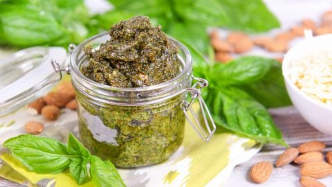 Jar of homemade basil almond pesto.