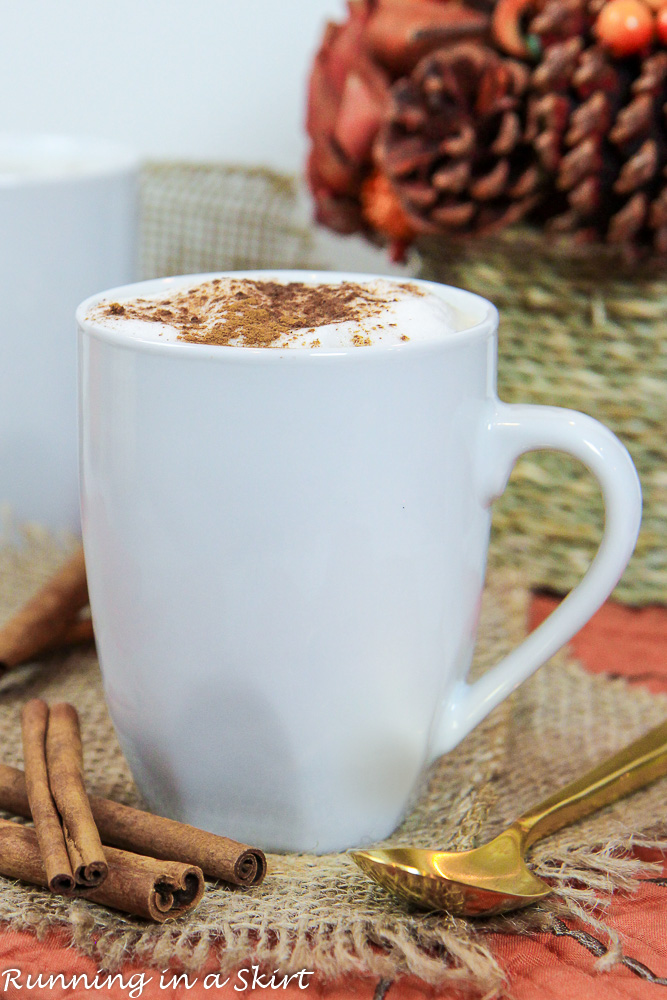 White mug with dirty chai latte.