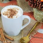 White mug with dirty chai latte.