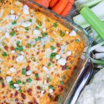 A glass pan of buffalo cauliflower dip.