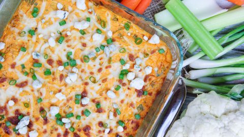 A glass pan of buffalo cauliflower dip.