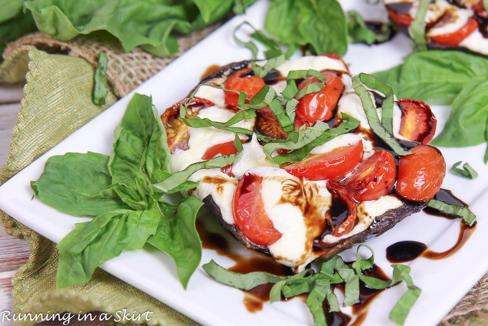 Caprese Stuffed Portobello Mushrooms on a white plate.