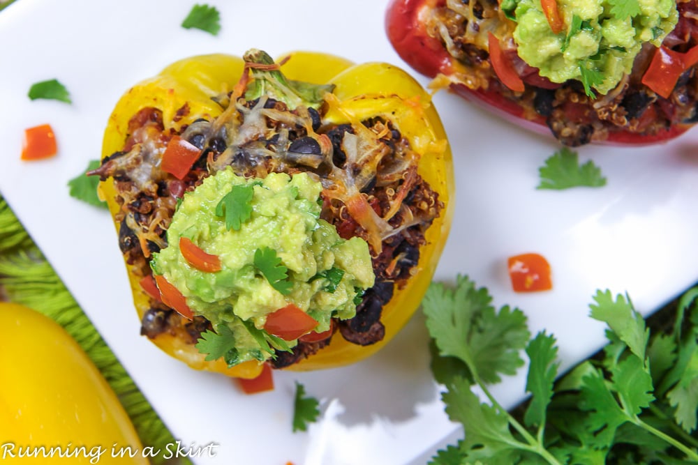 Vegetarian Stuffed Pepper on a white plate with toppings.