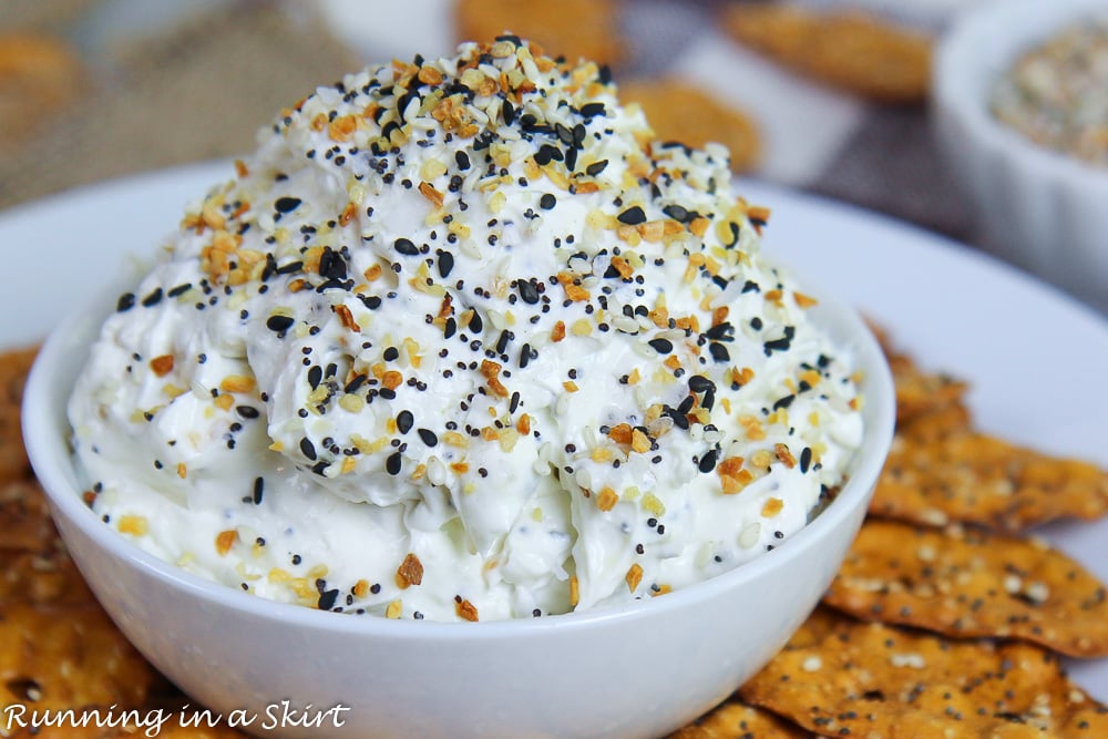Healthy Everything Bagel Dip in a white bowl with Everything But the Bagel Seasoning.